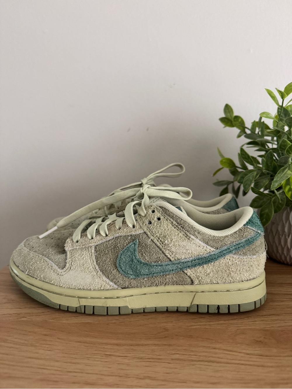 Nike Women’s Low-Top Suede Sneakers in Beige with Teal Swoosh